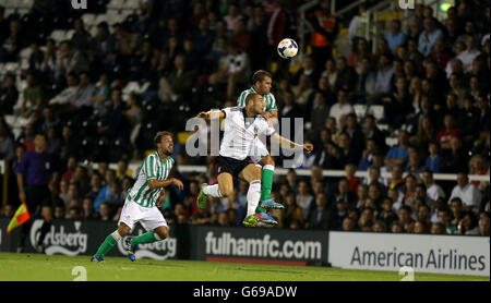 Fulham's Patjim Kasami (centre) battles for possession of the ball with Real Betis' Javier Chica (right) and Javier Matilla (left) Stock Photo