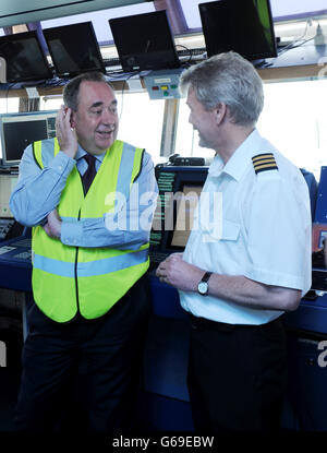 The First Minister Alex Salmond MSP meets Waldemar Walczak, c/o during a visit to Bibby Offshore's oil support vessel Polaris at Montrose South Quay, as it was announced by the Scottish Government that an expert commission will be established to examine how an independent Scotland could maximise the returns from North Sea oil and gas. Stock Photo
