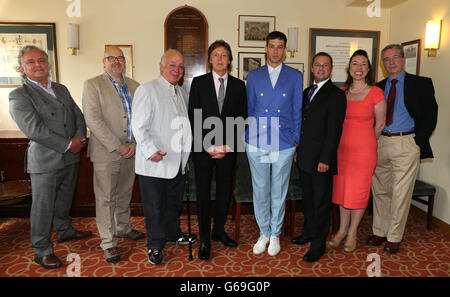 Sir Paul McCartney (centre) with Lipa's founding principal and chief executive Mark Featherstone-Witty (right) and the six luminaries (left To Right) Zenon Schoepe, Andy Hayles, Seymour Stein, Mark Ronson, Stephen Mear and Rowena Morgan who were installed at the Liverpool Institute for Performing Arts ceremony at The Philharmonic Hall, Liverpool. Stock Photo