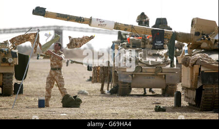 A Challenger 2 tank of the Scots Dragoon Guards being used as a washing line after being involved in action in Basra, southern Iraq. Photo by Dan Chung, The Guardian, MOD Pool Stock Photo