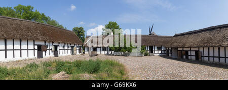 Lyngby, Denmark - June 23, 2016: Panoramic view of courtyard of an ancient danish farmhouse. Stock Photo