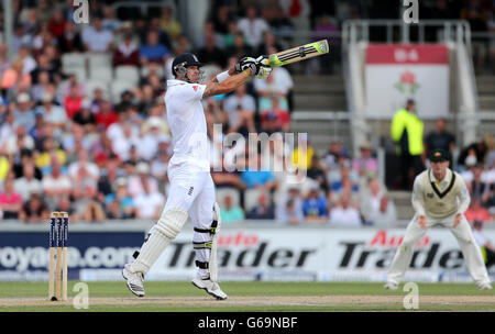 England batsman Kevin Pietersen hits a 4 to get his 100 during day three of the Third Investec Ashes test match at Old Trafford Cricket Ground, Manchester. Stock Photo