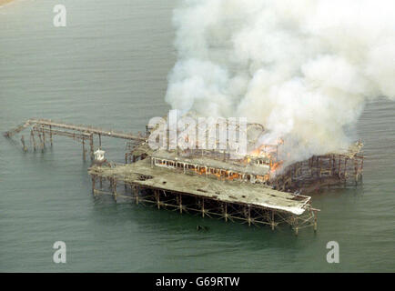 Smoke billows from Brighton s West Pier after fire broke out. The fire comes just a month after plans were made to offer the historic pier a 30 million salvage package. * The local fire service said the blaze was being treated as arson and added that a black speedboat seen nearby 10 minuted before could be connected. Stock Photo