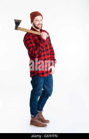 Young bearded man with big axe looking at camera isolated on the white background Stock Photo