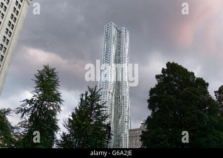 An apartment skyscraper designed by Frank Gehry is at 8 Spruce St. in Manhattan’s Financial District, New York City. Stock Photo