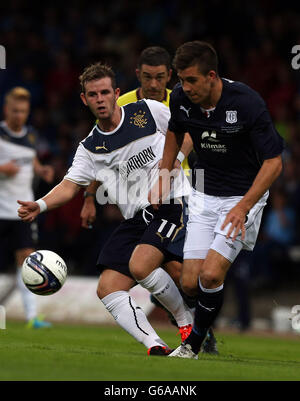 Rangers David Templeton holds off Dundee's Gavin Rae during the Pre-Season Friendly at Dens Park, Dundee. Stock Photo
