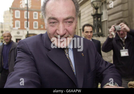 Iraqi-born business tycoon and billionaire Nadhmi Auchi leaves Bow Street Magistrates Court in central London where he is facing possible extradition charges. * Mr Auchi, a British citizen, is wanted by the French authorities in connection with the biggest fraud trial in French history relating to the takeover of a Spanish oil refinery, Ertoil, and its subsequent sale to Elf in 1990. The tycoon also has strong links to the Labour Party. Stock Photo