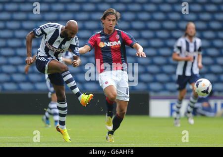 Soccer - Pre-season Friendly - West Bromwich Albion v Bologna - The Hawthorns. West Bromwich Albion's Nicolas Anelka tussles with Bologna's Rene Krhin during the Pre-season Friendly at The Hawthorns, West Bromwich. Stock Photo
