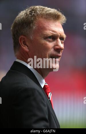 Manchester United's manager David Moyes looks on ahead of their English