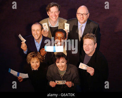 Clockwise from bottom left; actress Zoe Wannamaker, actress Frances Barber, actor Kenneth Branagh, CEO of Travelex Lloyd Dorfman, actor Alex Jennings, the new artisitc director of the National Theatre Nicholas Hytner and actor Adrian Lester (centre) during a photocall at Olivier, Royal National Theatre in London, to promote the Travelex 10 Season. The initiative aims to make world-class theatre more accessible and affordable by selling tickets for the Olivier's May to November 2003 season at the reduced rate of 10. Stock Photo