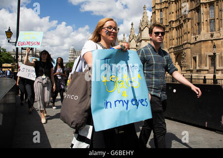 London, UK. 24th June, 2016. Protesters march towards College Green in Westminster outside the Houses of Parliamant following a Leave vote, also known as Brexit as the EU Referendum in the UK votes to leave the European Union on June 24th 2016 in London, United Kingdom. Membership of the European Union has been a topic of debate in the UK since the country joined the EEC, or Common Market in 1973. Credit:  Michael Kemp/Alamy Live News Stock Photo