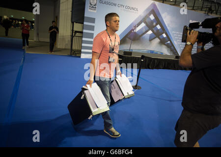 Glasgow, UK. 23rd June, 2016. The ballot boxes containing the votes arrive in the Emirates Arena to begin the count of votes, as voting takes place on the United Kingdom's referendum on European Union membership, in Glasgow, Scotland, on 23 June 2016. Credit:  jeremy sutton-hibbert/Alamy Live News Stock Photo