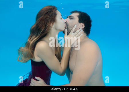 October 15, 2014 - Odessa, pool, Ukraine - Man and woman kissing under water, Underwater fasihon in the pool, Odessa, Ukraine (Credit Image: © Andrey Nekrasov/ZUMA Wire/ZUMAPRESS.com) Stock Photo