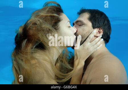 October 15, 2014 - Odessa, pool, Ukraine - Man and woman kissing under water, Underwater fasihon in the pool, Odessa, Ukraine (Credit Image: © Andrey Nekrasov/ZUMA Wire/ZUMAPRESS.com) Stock Photo