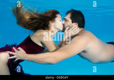 October 15, 2014 - Odessa, pool, Ukraine - Man and woman kissing under water, Underwater fasihon in the pool, Odessa, Ukraine (Credit Image: © Andrey Nekrasov/ZUMA Wire/ZUMAPRESS.com) Stock Photo