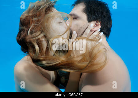 October 15, 2014 - Odessa, pool, Ukraine - Man and woman kissing under water, Underwater fasihon in the pool, Odessa, Ukraine (Credit Image: © Andrey Nekrasov/ZUMA Wire/ZUMAPRESS.com) Stock Photo