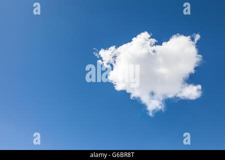 Cloud in heart shape in front of blue sky Stock Photo - Alamy