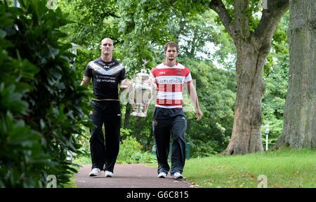 Wigan Warriors captain Sean O'Loughlin (right) and Hull FC captain Gareth Ellis hold the Challenge Cup, during a media day at Worsley Park Marriott Hotel, Manchester. Stock Photo