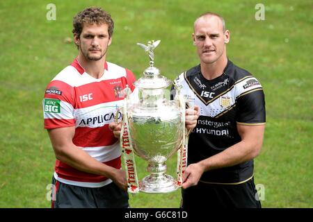 Wigan Warriors captain Sean O'Loughlin (left) and Hull FC captain Gareth Ellis hold the Challenge Cup, during a media day at Worsley Park Marriott Hotel, Manchester. Stock Photo