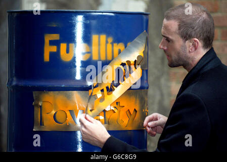 Actor Joseph Fiennes, poses for the media during a photocall in London to launch Christian Aid's Oil and Poverty Report. The report reveals the human cost to poor communities across the world because of the west's thirst for oil and comes during Christian Aid Week. Stock Photo