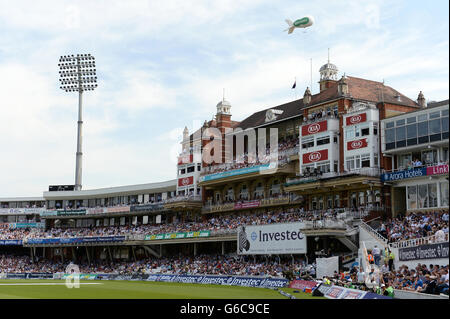 The crowds enjoy the action from The Pavilion at the Kia Oval Stock Photo