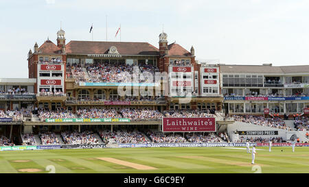 The crowds enjoy the action from The Pavilion at the Kia Oval Stock Photo