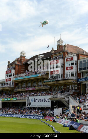 The crowds enjoy the action from The Pavilion at the Kia Oval Stock Photo