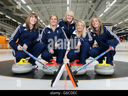 Curlers (left-right) Claire Hamilton, Vicki Adams, Anna Sloan and Eve Muirhead with coach Rhona Howie (rear) on the ice after being named in the winter Olympic team for Sochi after a press conference at the Braehead Curling Rink, Glasgow. Stock Photo