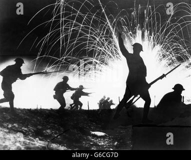 1910s 1918 WORLD WAR I ANONYMOUS SILHOUETTED AMERICAN EXPEDITIONARY FORCE SOLDIERS WITH FIXED BAYONETS CHARGING IN NIGHT BATTLE Stock Photo