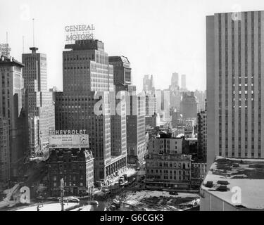 1950s LOOKING SOUTH AT 61ST STREET COLISEUM TOWER COLUMBUS CIRCLE EXCAVATION FOR NEW BUILDING BOTTOM CENTER NEW YORK CITY NY USA Stock Photo