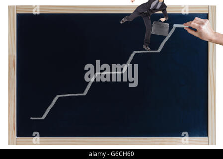 a view of a businessman on a blackboard Stock Photo