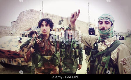 Islamic State of Iraq and the Levant propaganda photo showing masked ...