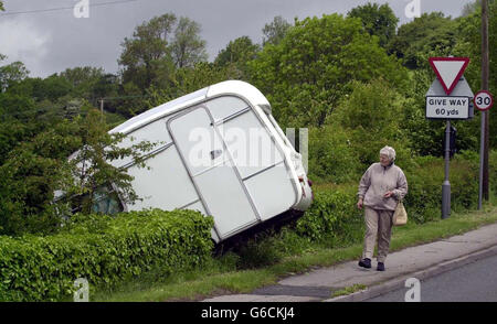 Rose Tarr caravan in hedge Stock Photo - Alamy
