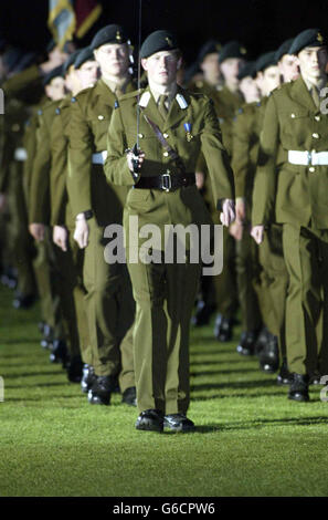 Prince Harry, youngest son of the Prince of Wales and grandson of Britain's Queen Elizabeth II, took charge of a 48-strong parade of military cadets at Eton fuelling speculation that he may opt for a military career. * Harry, 18, was appointed Commander of Eton's Combined Cadet Force's formal trooping of the colour ceremony. The Prince of Wales was among those looking on as his youngest son led the guard of honour's march out on to College Field with their colours at the yearly tattoo, held since The Corps was founded in 1860. Stock Photo