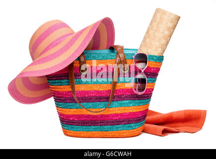 Colorful striped beach bag with a straw hat towel and sunglasses Stock ...
