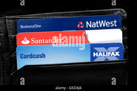 General view of a Halifax, Santander and NatWest bank card in a wallet Stock Photo