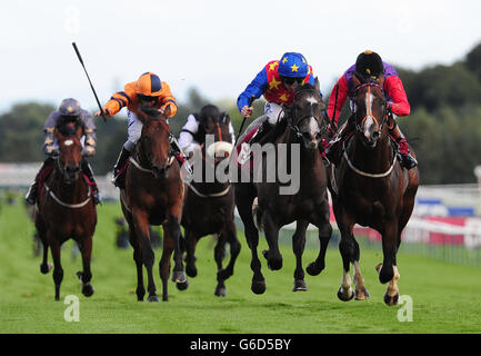 Kickboxer ridden by Paul Hanagan (second right) beats Musical Comedy ridden by Richard Hughes (right) to win the Betfred Treble Odds On Lucky 15s Nursery Handicap Stakes during the Betfred Sprint Cup Festival at Haydock Park Racecourse, Newton-le-Willows. Stock Photo