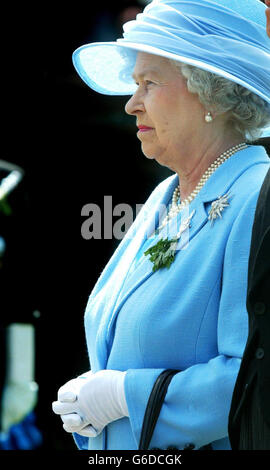 Britain's Queen Elizabeth II holds her handbag as she presides over the  Tynwald ceremony on the Isle of Man Stock Photo - Alamy