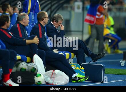 Soccer - FIFA World Cup Qualifying - Group H - Ukraine v England - Olympic Stadium. England manager Roy Hodgson (right) in the dugout Stock Photo