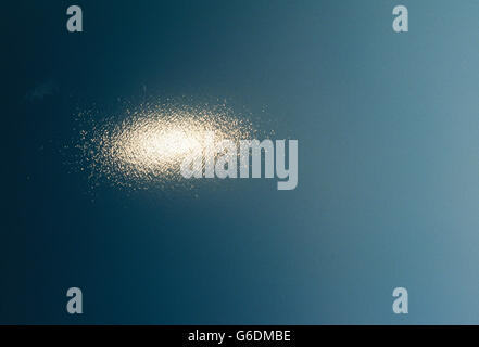 Aerial view of sun reflecting off ripples of water in the Atlantic Ocean Stock Photo