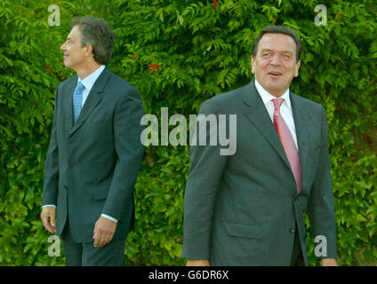 Prime Minister Tony Blair (left) and German Chancellor Gerhard Schroeder whilst posing for photographers at the Progressive Governance Summit in Berkshire. The summit on Sunday night was also attended by 12 other world leaders. Stock Photo