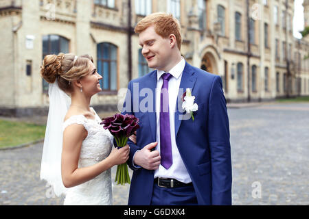 The bride groom gently embraced Stock Photo