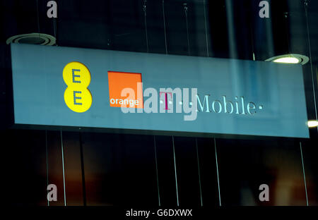 General view of an EE phone shop in Birmingham, promoting EE, Orange and T Mobile services. Stock Photo