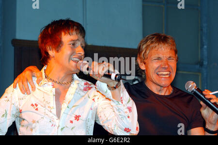 Cast members Tim Howard (left) and Mike McKell (right) at the launch of the new musical 'Tonight's The Night' at Joe Allen's bar in London's Covent Garden. The musical written by Ben Elton is inspired by the songs of Rod Stewart. * and previews at the Victoria Palace Theatre in London from 15/10/03. Stock Photo