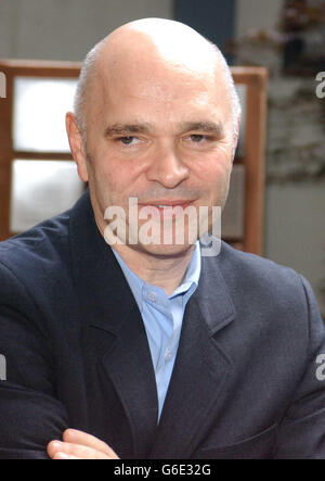 Anthony Minghella, new Chairman of the bfi poses for the media during a photocall at the Royal Free Hospital in West Hampstead, London, where he opened a patient garden, in the Ian Charleson Day Centre for patients with HIV/AIDS. Stock Photo