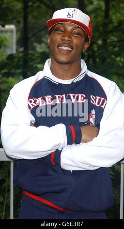 Rap Star Asher D after speaking with students from St John Rigby School, Sellhurst High School and Croydon college at the Warehouse theatre where they discussed gang culture, the theme of Knock Down Ginger, the new play which opens at the Warehouse. Stock Photo