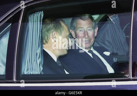 Russian President Vladimir Putin (right) is welcomed by the Prince of Wales at Heathrow Airport, London, at the start of their state visit. It is the first state visit by a Russian leader since the days of the Tsars. Stock Photo