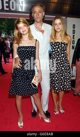 Bob Geldof and daughters Pixie (left) and Peaches, arriving at The Odeon Leicester Square, London, for the UK premiere of Charlie's Angels: Full Throttle. 11/09/2003: Celebrity dad Bob Geldof tonight, Thursday 11th September 2003, made an impassioned plea for fathers to be given equal access to their children when a marriage breaks down. Speaking at the launch of a book examining the subject, the rock star and businessman said he had been 'unfairly' treated by the judicial system when he separated from his TV presenter wife Paula Yates. Stock Photo