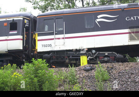 The derailed bogie of the rear locomotive of the Gatwick Express train which came off the track near Redhill station in Surrey. The accident happened at 0520 when the train was travelling at about 80 mph and closed two lines and caused severe disruption. * to trains on the London to Brighton route and other south coast routes. One woman passenger exacerbated a previous whiplash injury but none of the other 21 people on board was hurt. Stock Photo