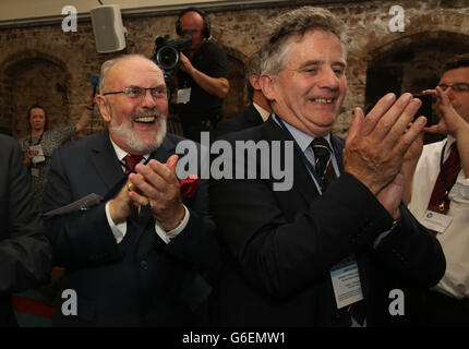 Senators David Norris (left) and Sean Barrett celebrate at Dublin Castle as Irish Government has suffered an embarrassing defeat in a referendum to abolish the country's upper house of parliament, with 51.7% of the public voting against it. Stock Photo